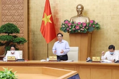 Thủ tướng Phạm Minh Chính phát biểu tại Phiên họp Chính phủ tháng 7/2021. (Ảnh: Dương Giang/TTXVN)