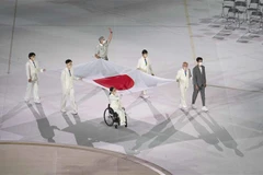 Lễ thượng cờ Nhật Bản tại Lễ khai mạc Paralympic Tokyo 2020 ở Tokyo, Nhật Bản, ngày 24/8/2021. (Ảnh: THX/TTXVN)