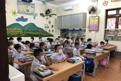 Học sinh lớp 1 Trường Tiểu học Minh Khai, thành phố Hà Giang. (Ảnh: Nguyễn Chiến/TTXVN)