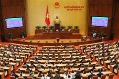 Quốc hội biểu quyết thông qua Nghị quyết bầu Chủ tịch nước với 469 phiếu tán thành (tương ứng 96,70%). (Ảnh: Dương Giang/TTXVN)