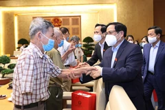 Thủ tướng Phạm Minh Chính gặp mặt, tri ân đại biểu Người có công với cách mạng. (Ảnh: Dương Giang/TTXVN)