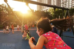 Môi trường gia đình là điều kiện tốt nhất cho sự phát triển toàn diện của trẻ em. (Ảnh minh họa: Lâm Khánh/TTXVN)