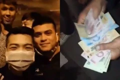 Nhóm thanh niên chặn đường xin đểu xe trên cao tốc (Ảnh: Cắt từ Clip. Nguồn: Facebook) 