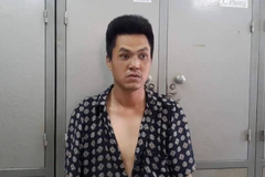 Đối tượng Đức tại cơ quan công an (Ảnh: PV/Vietnam+) 