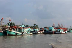 Tàu cá neo đậu tránh trú bão trên sông Cái Bé, xã Bình An, huyện Châu Thành (Kiên Giang). (Ảnh: Lê Huy Hải/TTXVN)