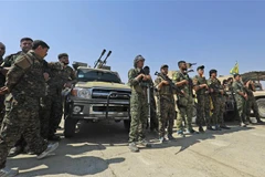 Các tay súng người Kurd tại thị trấn Shadadi, cách thành phố Hassakeh ở đông bắc Syria 60km, ngày 11/9/2018. (Ảnh: AFP/ TTXVN)