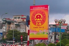 Tấm pano ghi sai tên nước được dựng lên suốt 2 tuần nay. (Ảnh: PV/Vietnam+)