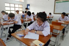 Thí sinh chuẩn bị làm bài thi kỳ thi chọn học sinh giỏi quốc gia Trung học phổ thông năm học 2022-2023. (Ảnh: Đức Hạnh/TTXVN)