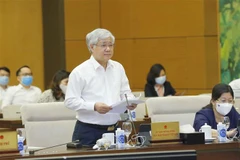 Chủ tịch Ủy ban Trung ương Mặt trận Tổ quốc Việt Nam Đỗ Văn Chiến trình bày báo cáo (tóm tắt). (Ảnh: Doãn Tấn/TTXVN)