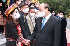 Chiều 17/11, tại Phủ Chủ tịch, Chủ tịch nước Nguyễn Xuân Phúc gặp mặt thân mật Đoàn đại biểu người có uy tín, trưởng thôn tiêu biểu tỉnh Bắc Kạn. (Ảnh: Thống Nhất/TTXVN)