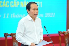 Phó Chủ tịch-Tổng Thư ký Ủy ban Trung ương Mặt trận Tổ quốc Việt Nam Lê Tiến Châu phát biểu tại hội nghị. (Ảnh: Minh Đức/TTXVN)