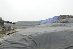 Một góc bãi rác Xuân Sơn (Sơn Tây, Ba Vì, Hà Nội. (Ảnh: Mạnh Khánh/TTXVN)