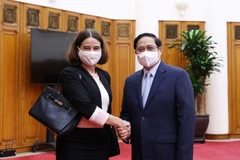 Thủ tướng Phạm Minh Chính tiếp Đại sứ Australia tại Việt Nam Robyn Mudie. (Ảnh: Dương Giang/TTXVN)