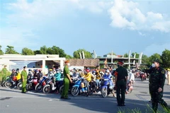 Người dân về Cà Mau từ vùng dịch tăng cao. (Nguồn: TTXVN)