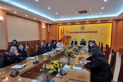 Điểm cầu theo dõi phiên tòa trực tuyến tại Tòa án Nhân dân thành phố Hà Nội. (Ảnh: Kim Anh/TTXVN)