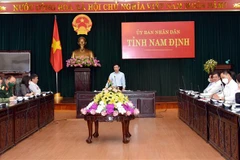 Chủ tịch UBND tỉnh Nam Định Phạm Đình Nghị phát biểu tại cuộc họp Ban Chỉ đạo phòng, chống dịch COVID-19 chiều 15/10. (Ảnh: Văn Đạt/TTXVN)