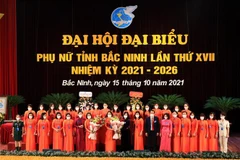 Ra mắt Ban Chấp hành Hội Liên hiệp Phụ nữ tỉnh Bắc Ninh khóa XVII, nhiệm kỳ 2021-2026. (Ảnh: Đinh Văn Nhiều/TTXVN)