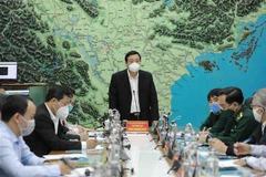 Phó trưởng Ban chỉ đạo Quốc gia về phòng, chống thiên tai Trần Quang Hoài phát biểu chỉ đạo công tác ứng phó với áp thấp nhiệt đới. (Ảnh: Vũ Sinh/TTXVN)