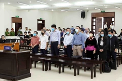 Các bị cáo tại phiên tòa. (Ảnh: Phạm Kiên/TTXVN)