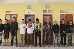 Các đối tượng liên quan bị cơ quan công an bắt giữ. (Nguồn: nld.com.vn)