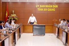Quang cảnh cuộc họp Ban Chỉ đạo Phòng, chống dịch COVID-19 tỉnh An Giang. (Ảnh: Thanh Sang/TTXVN)