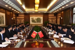 Toàn cảnh hội đàm giữa Thứ trưởng Trần Thanh Nam với Thứ trưởng Bộ Nông nghiệp Nông thôn Trung Quốc Khuất Đông Ngọc. (Ảnh: Lương Tuấn/TTXVN)