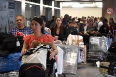 Một nhóm bác sỹ Cuba rời khỏi Brazil. (Nguồn: Getty Images)