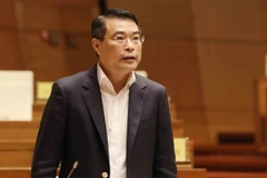 Thống đốc Ngân hàng Nhà nước Việt Nam Lê Minh Hưng phát biểu giải trình, làm rõ một số vấn đề đại biểu Quốc hội nêu. (Ảnh: Phương Hoa/TTXVN)