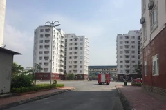 Vị trí đặt cây ATM nằm tại chung cư 9 tầng CT1-thuộc chung cư Than Nam Mẫu, ngay gần quốc lộ 18 và bên cạnh công ty Cao su Sao vàng, có rất đông công nhân đang nằm việc. (Nguồn: TTXVN phát)