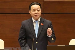 Bộ trưởng Bộ Tài nguyên và Môi trường Trần Hồng Hà trả lời chất vấn của đại biểu Quốc hội. (Ảnh: Doãn Tấn/TTXVN)