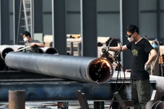 Sản xuất thép ống tại tỉnh An Huy, Trung Quốc ngày 3/5/2018. (Nguồn: AFP/TTXVN)