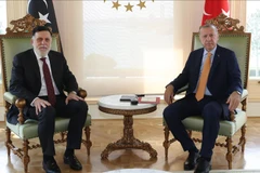 Tổng thống Thổ Nhĩ Kỳ Recep Tayyip Erdogan (phải) và Thủ tướng GNA Fayez al-Sarraj. (Nguồn: Anadolu)
