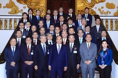 Thủ tướng Nguyễn Xuân Phúc với các đại biểu. (Ảnh: Thống Nhất/TTXVN)