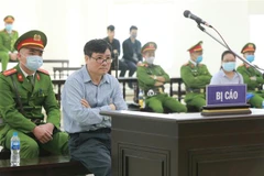 Bị cáo Trương Duy Nhất (56 tuổi, ngụ ở quận Hải Châu, TP.Đà Nẵng), cựu Trưởng Văn phòng đại diện Báo Đại Đoàn Kết tại trung Trung bộ tại phiên tòa. (Ảnh: Doãn Tấn/TTXVN)