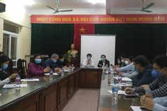 Cuộc họp khẩn của Hà Nội trước thông tin ca mắc COVID-19 thứ 39. (Ảnh: PV/Vietnam+)