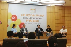 Tọa đàm “Cơ hội và rủi ro khi ra mắt thị trường phái sinh,” ngày 15/6. (Ảnh: PV/Vietnam+)