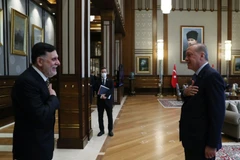 Tổng thống Recep Tayyip Erdogan và nhà lãnh đạo Fayez al-Serraj. (Ảnh: Metro.us)