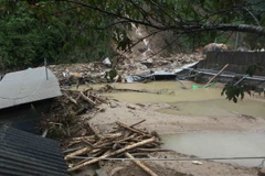 Trang trại nuôi cá nước lạnh bị tan hoang sau khi lũ dữ đi qua của gia đình nhà ông Dương Ngọc Hưng tại bản Chu Va 12, xã Sơn Bình, huyện Tam Đường, Lai Châu. (Ảnh: Quý Trung/TTXVN)