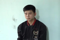 Đối tượng Nguyễn Quốc Huy tại cơ quan điều tra. (Ảnh: TTXVN phát)