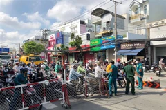 Tình trạng ùn ứ ở các chốt kiểm soát phòng dịch tại Gò Vấp những ngày trước đã không còn. (Ảnh: TTXVN phát)