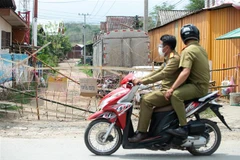 Một khu chợ phải đóng cửa do dịch COVID-19 tại Luang Prabang, Lào. (Ảnh: THX/TTXVN)