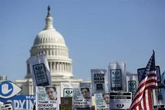 Người biểu tình tại Mỹ hôm 26/10. (Nguồn: Reuters)