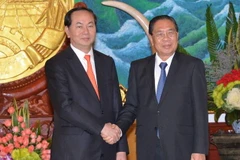 Tổng Bí thư, Chủ tịch nước Chummaly Sayasone tiếp Bộ trưởng Trần Đại Quang. (Ảnh: Phạm Kiên/Vietnam+)