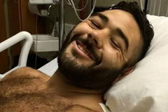 Chris Mintz đã trở thành người hùng khi lấy thân mình chắn đạn cứu bạn trong vụ xả súng. (Nguồn: express)