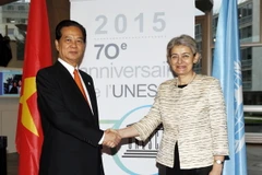 Thủ tướng Chính phủ Nguyễn Tấn Dũng và bà Irina Bokova, Tổng ​giám đốc UNESCO. (Ảnh: Đức Tám/TTXVN)