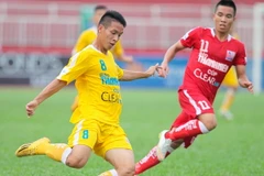 U21 Hà Nội T&T (áo vàng) giành chức vô địch. (Ảnh: Quang Nhựt/TTXVN)