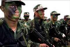 Lực lượng đặc nhiệm trong một đợt huấn luyện ở Bắc Kinh. (Ảnh: english.peopledaily.com.cn)