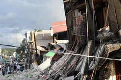 Cảnh tàn phá ở Port-au-Prince sau trận động đất. (Ảnh: AFP/TTXVN) 