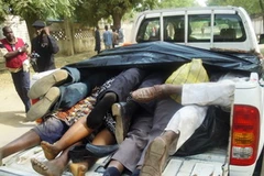 Xác các nạn nhân trong các vụ bạo lực ở Kano. (Nguồn: AFP/TTXVN)