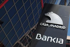 Logo của ngân hàng Bankia bên ngoài trụ sở chính tại Madrid, Tây Ban Nha. (Nguồn: Reuters) 